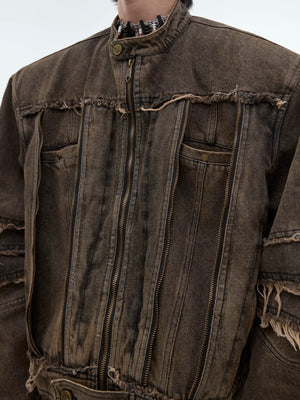 Close up of metallic fringe and distressed denim texture