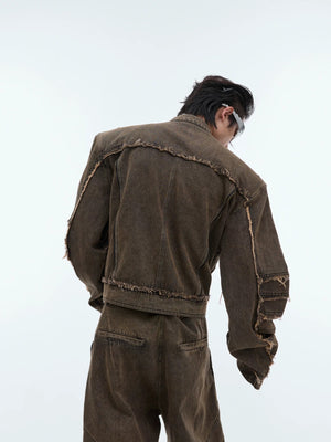 Back view of loose fit deconstructed denim jacket