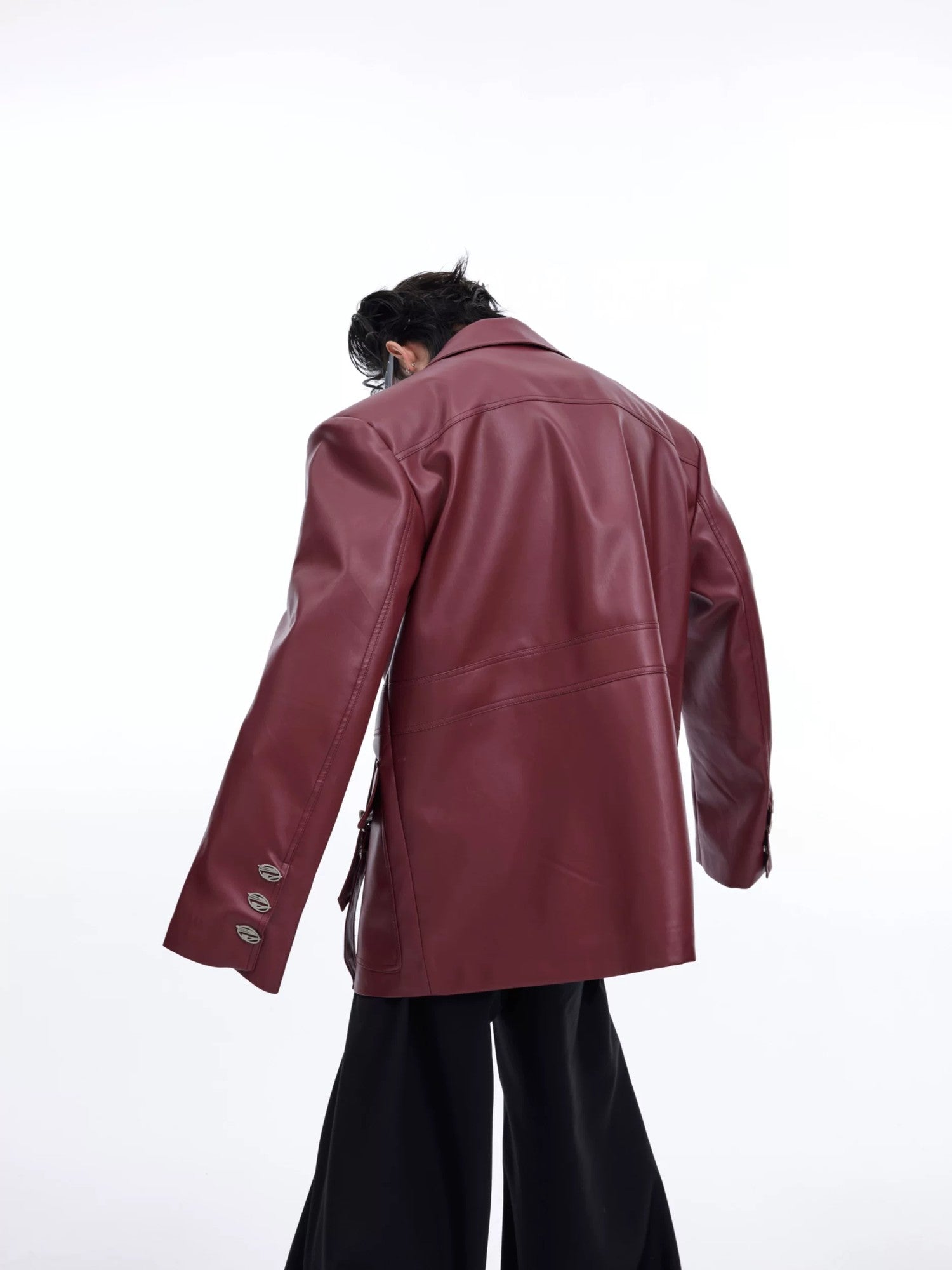 Men's black deconstructed leather jacket in a loose streetwear fit