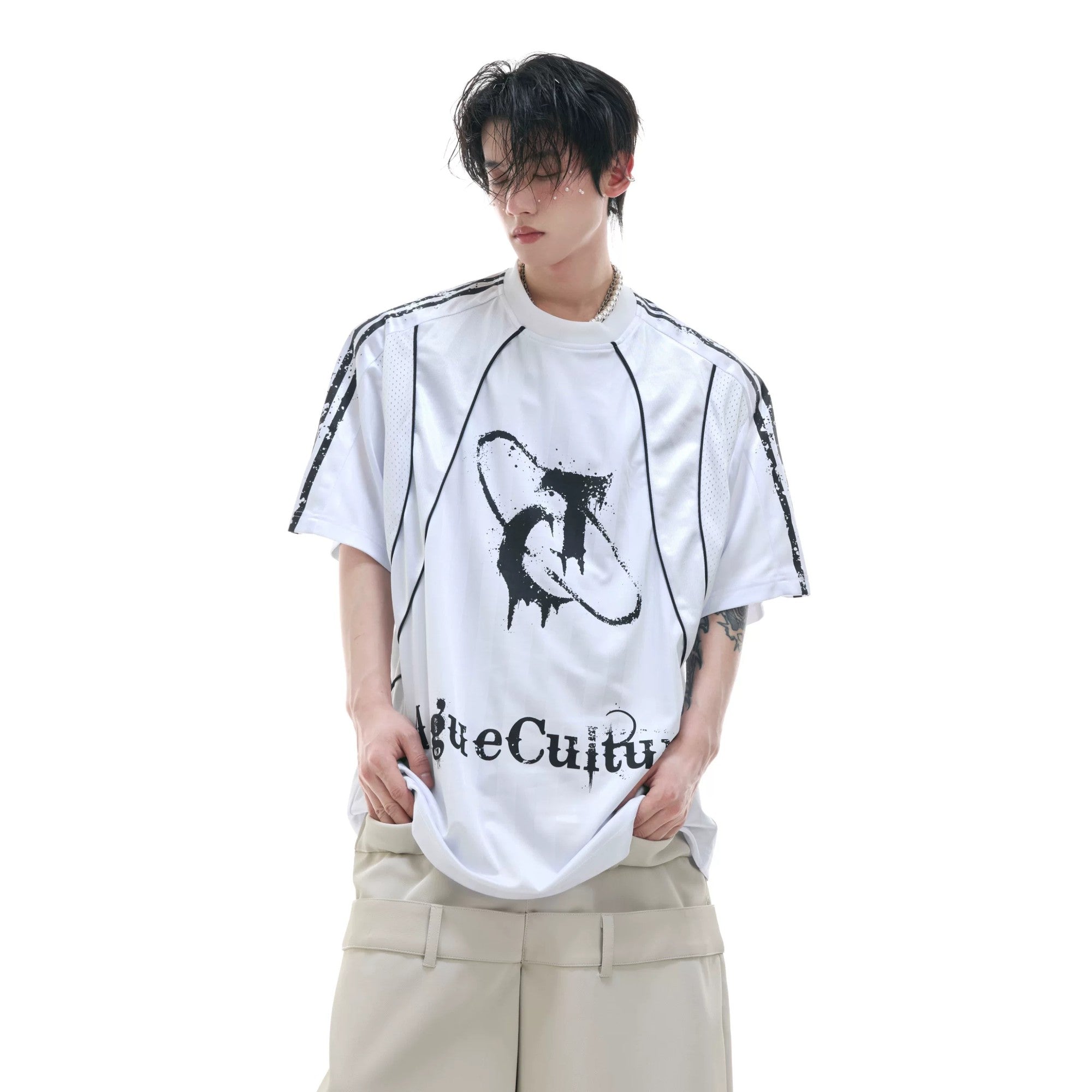 Front view of gray distressed paneled streetwear jersey tee