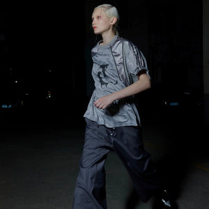 Back view showing number 8 distressed print on streetwear jersey