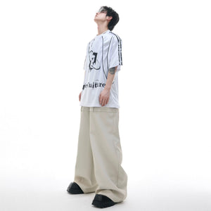 Close up of paneled stitching and fabric texture on jersey tee