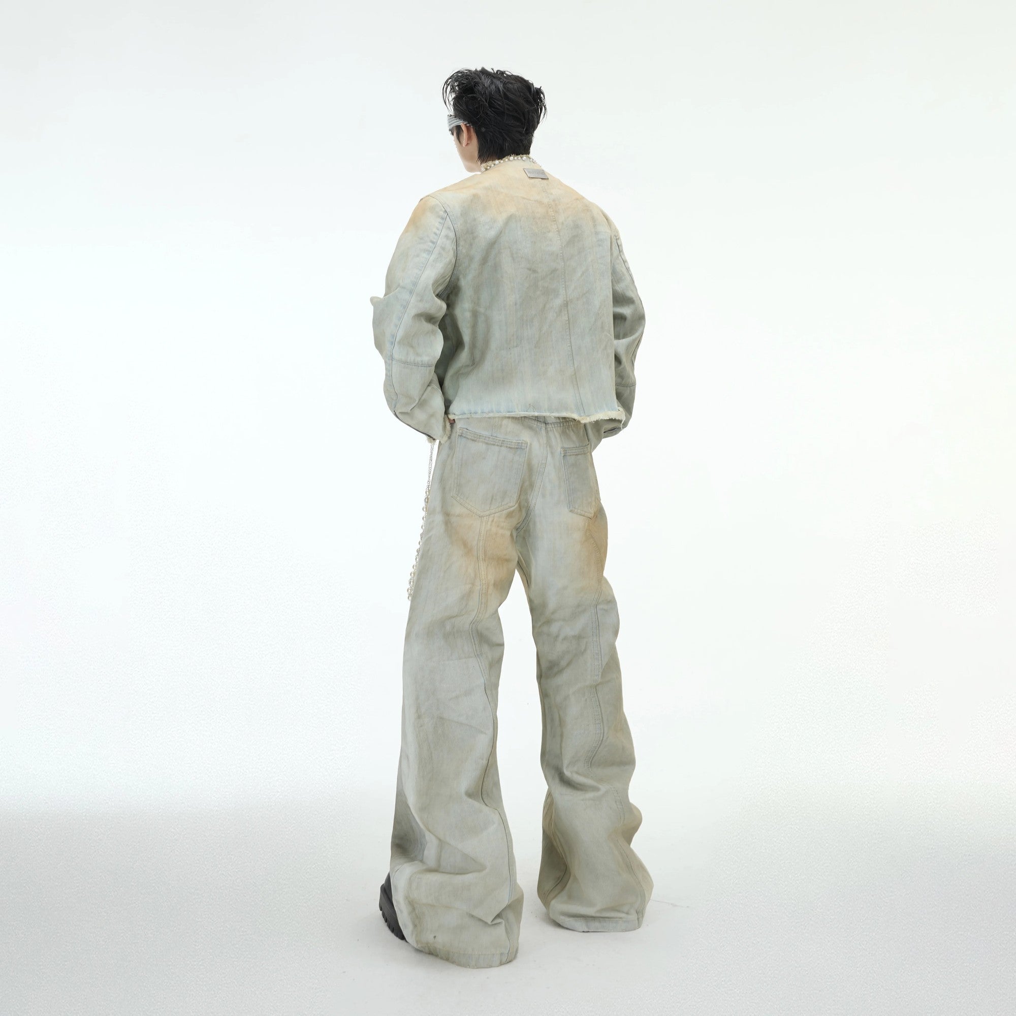 Vintage washed micro-flare denim jeans with distressing