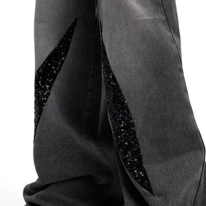 Back view of loose fit straight leg jeans in vintage charcoal grey