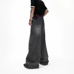 Model wearing deconstructed sequin jeans in an urban street setting