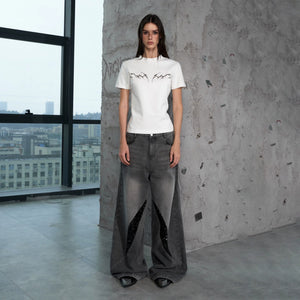 Full length view of distressed sequin denim for streetwear outfits