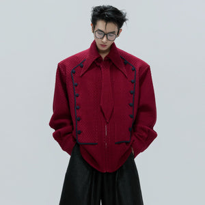 Detailed view of red palace jacket featuring double-breasted buttons