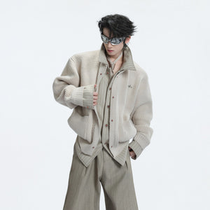 Side profile of camel cashmere blend cardigan showing the striped design