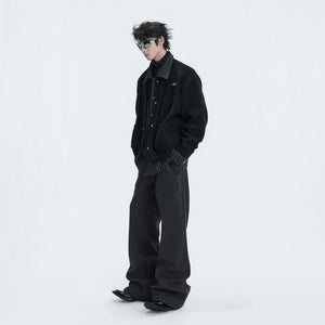 Macro shot of the luxury jewel-encrusted metal buttons on the cardigan