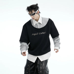 Model wearing black faux layered deconstructed sweatshirt in loose fit.
