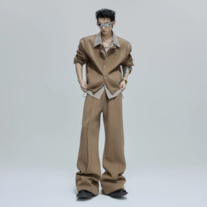 Close-up of the striped shirt layering detail and stand collar