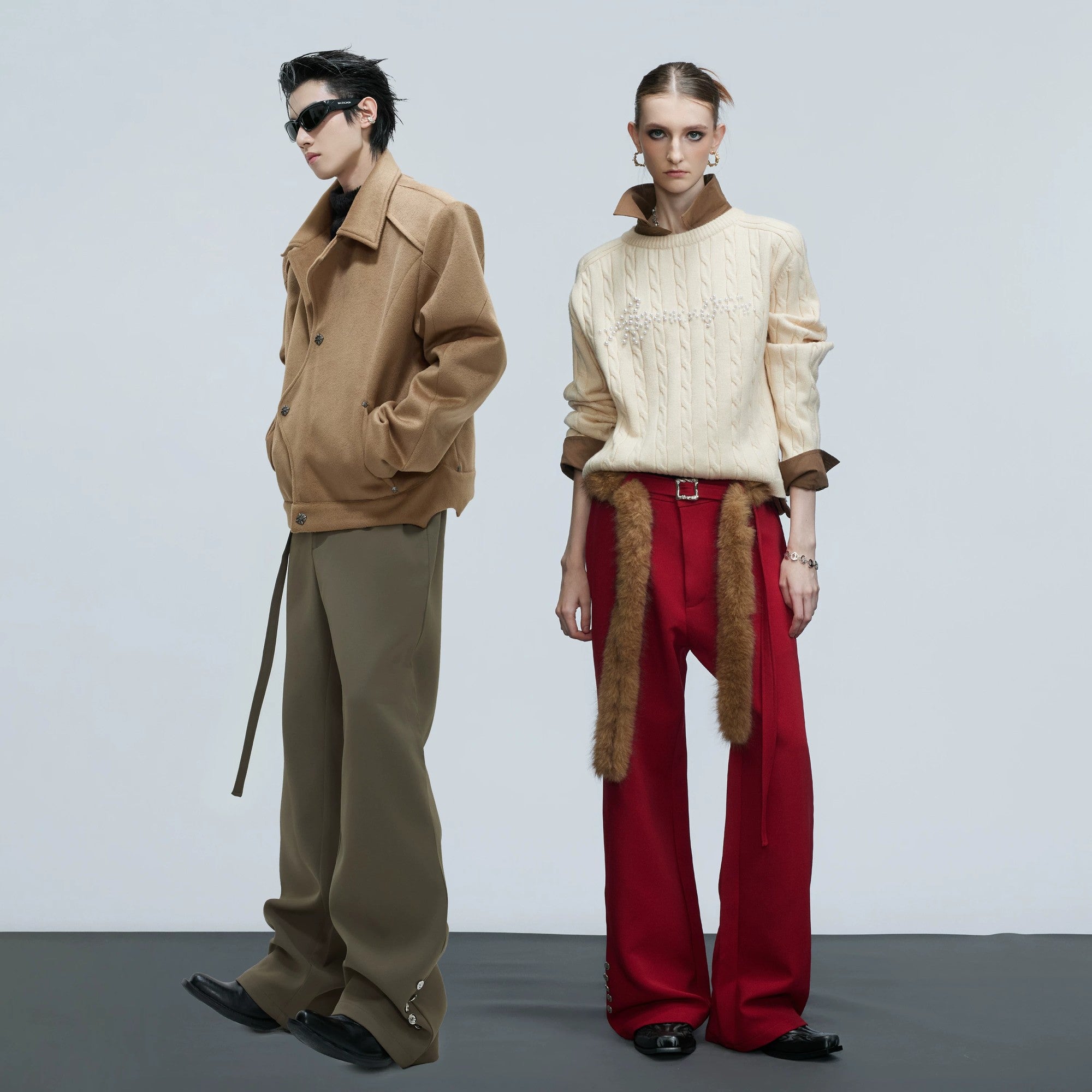 Close up of detachable raccoon fur trim on luxury flare pants