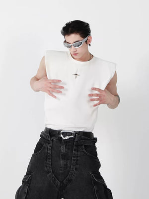 Model wearing oversized futuristic sleeveless top in urban setting