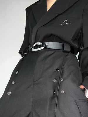 Close-up of matte texture and geometric metal buckle design