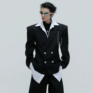 Back view showing the loose fit and padded shoulders of the blazer