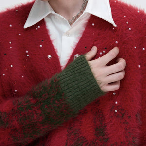 Close up of hand-applied pearls on faux mink knit fabric
