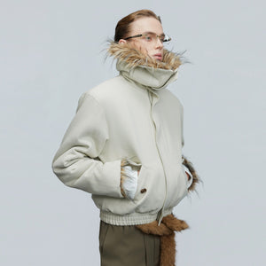 Close-up of the oversized faux fur collar and washed cotton texture
