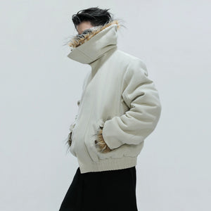 Side view showing the cropped boxy fit and sleeve volume