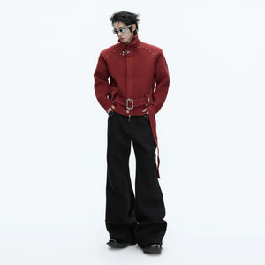 Back view of deconstructed heavyweight knit jacket showing silhouette