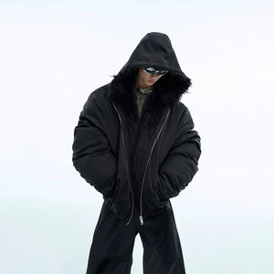 White oversized waterproof hooded jacket showing drop shoulder design.