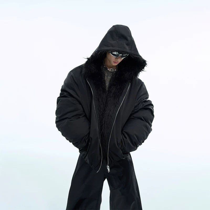 White oversized waterproof hooded jacket showing drop shoulder design.