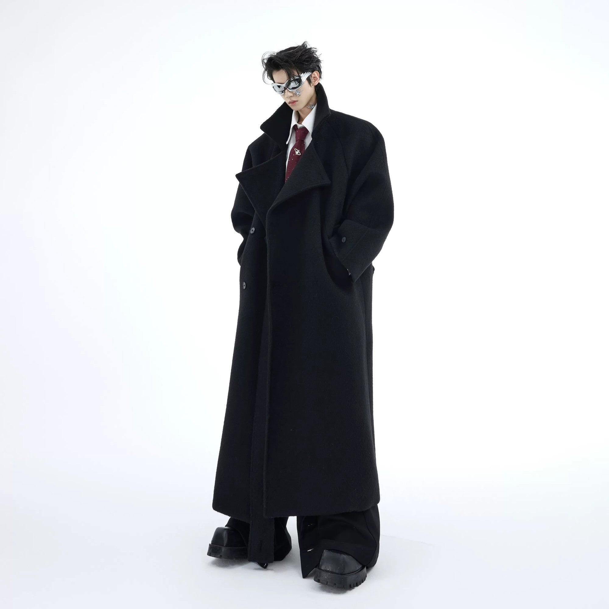 Front view of a premium heavyweight oversized long wool coat in black