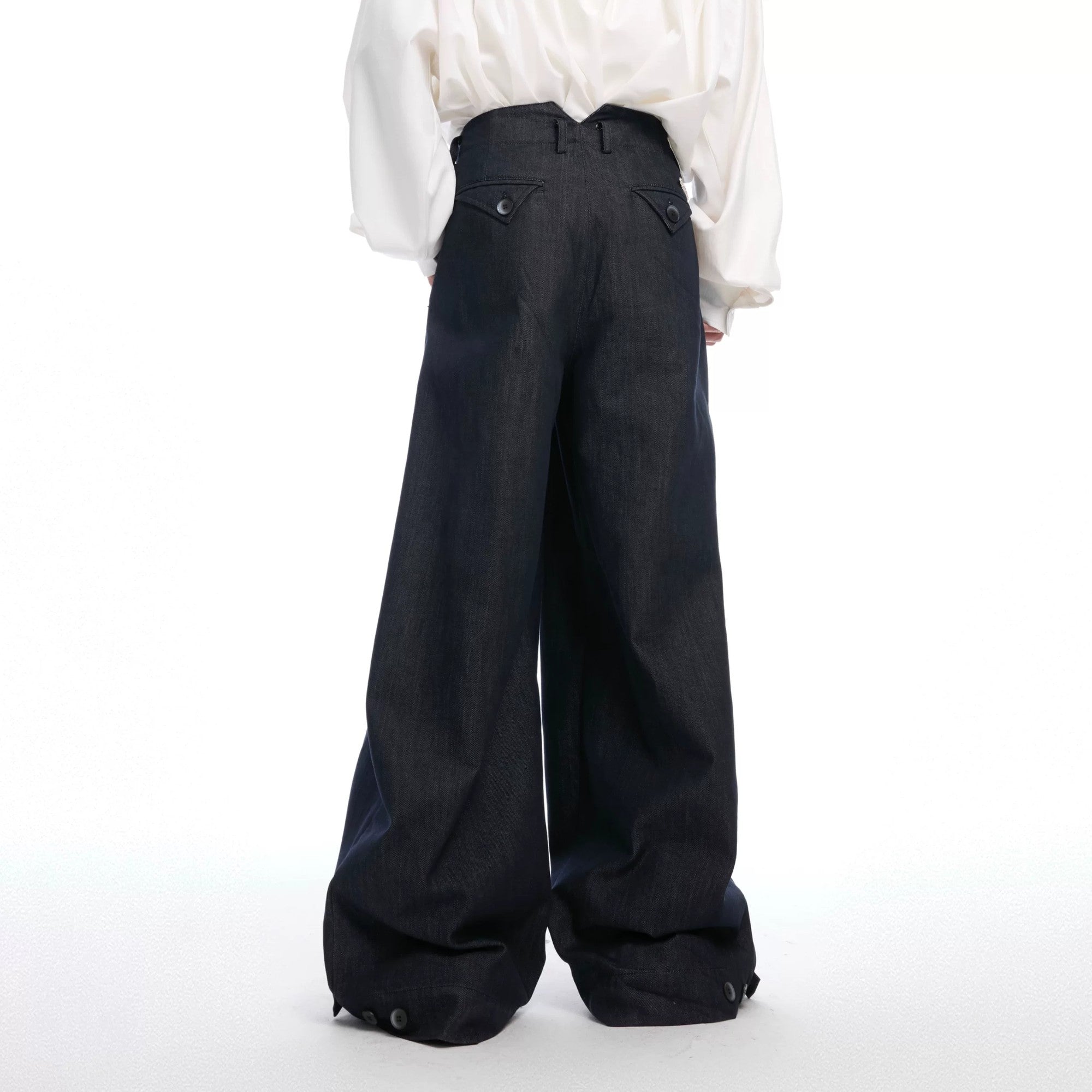 Back view of vintage loose fit denim trousers with relaxed silhouette