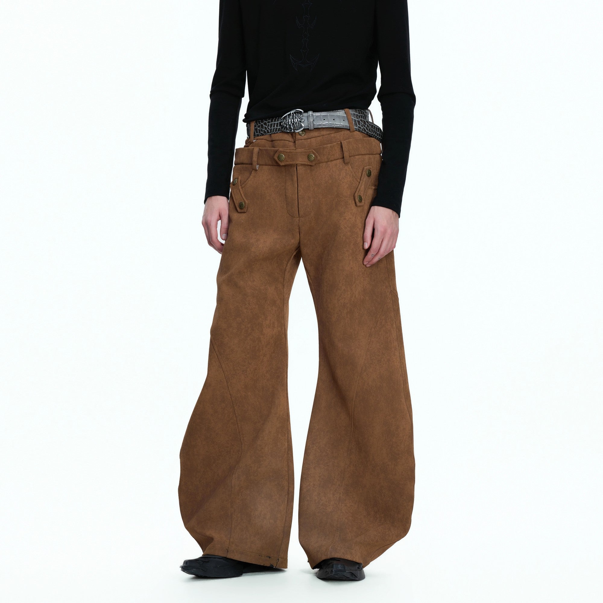 Front view of heavyweight vintage suede curved paneled pants in brown