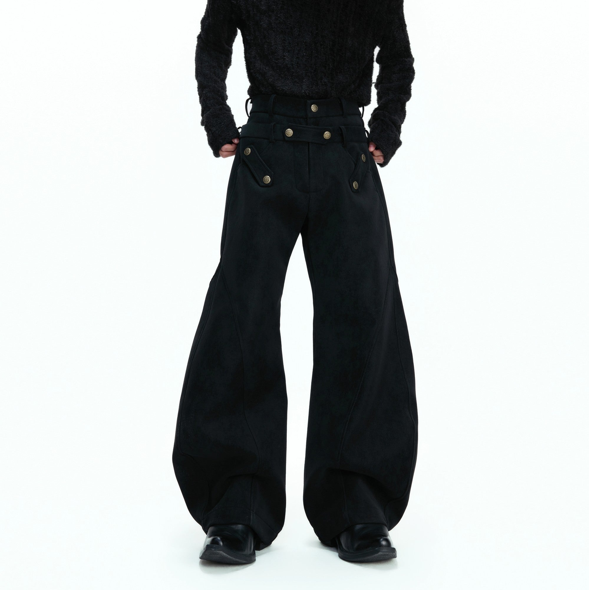 Close-up of distressed suede texture and paneled stitching details