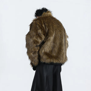 Detailed shot of the detachable premium fur collar on the sweater