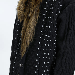 Model wearing the white heavyweight vintage fur cardigan in a street setting