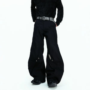 Back view of baggy street style canvas pants with distressed finish