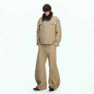 Lifestyle shot of curved panel canvas pants paired with sneakers