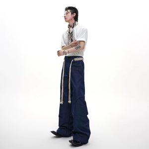 Blue baggy straight leg pants with industrial cutout streetwear style