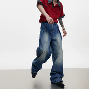 Side profile of loose straight leg jeans showing 3D pleated cut
