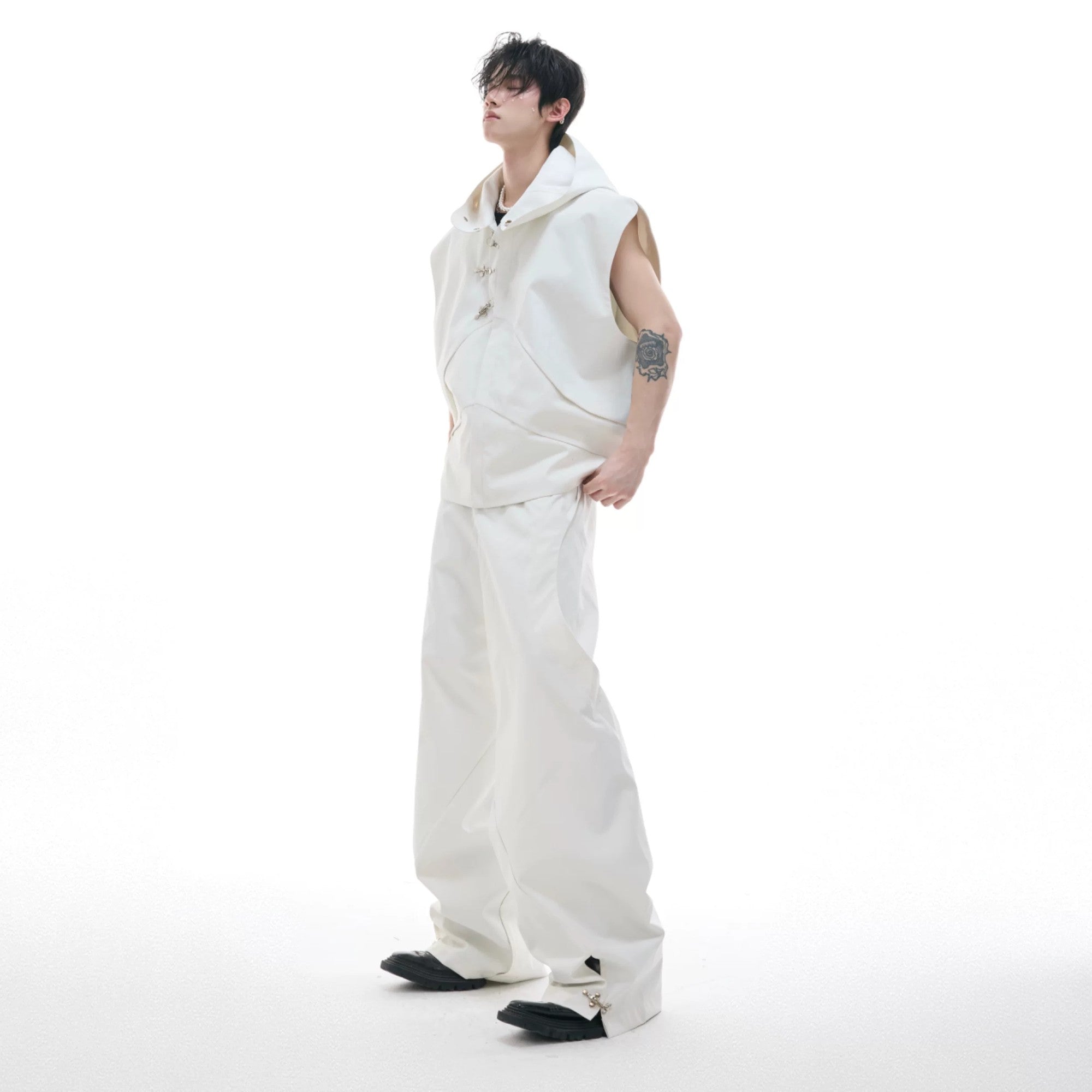 Black techwear hooded sleeveless vest and matching pants set front view