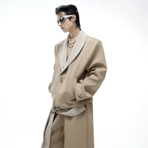 Close up of the V-neck contrast stitching and hardware on the jacket