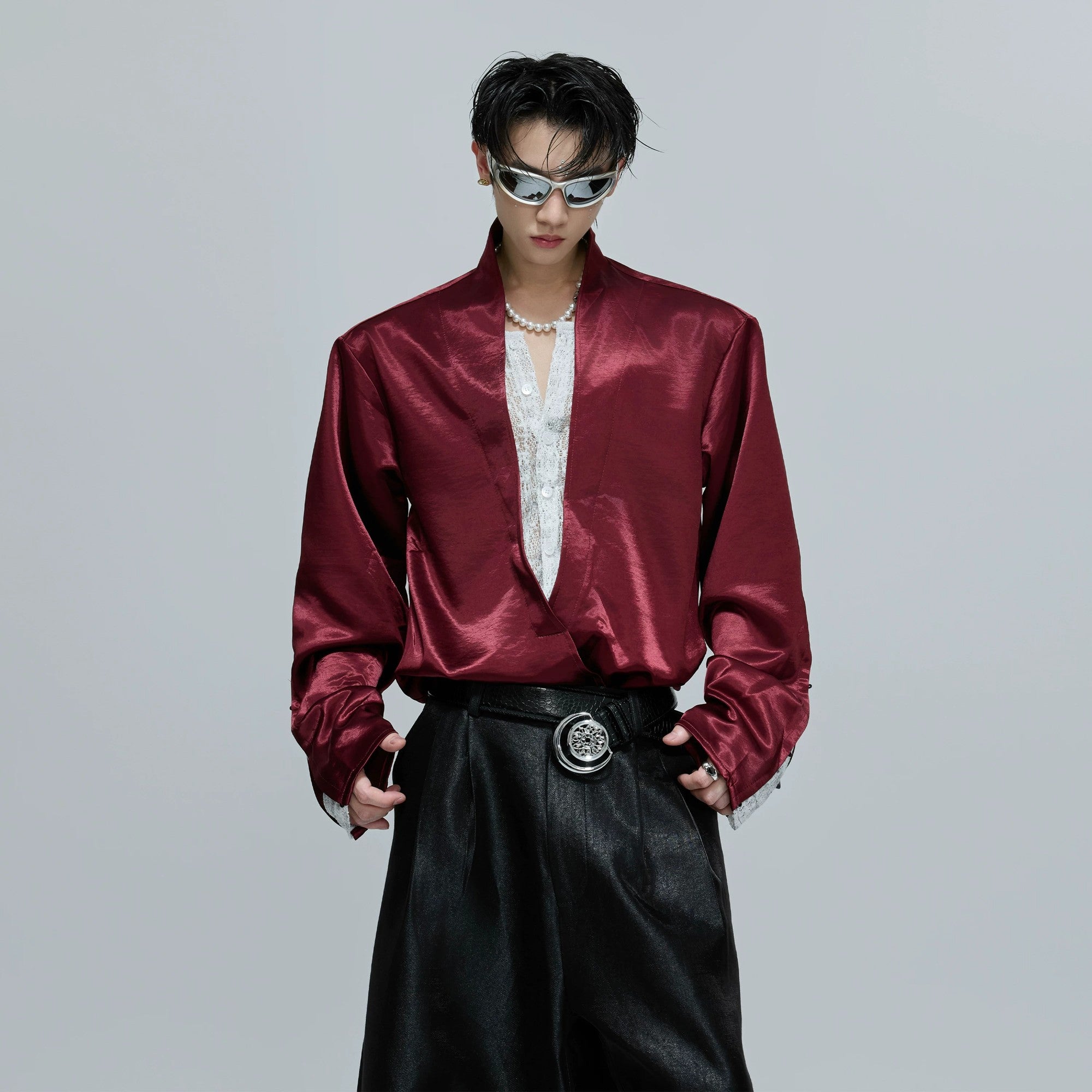 Front view of a white lace patchwork cropped satin blouse for women