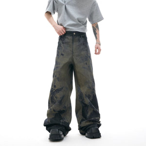 Front view of vintage blue laser engraved baggy jeans with wide leg fit