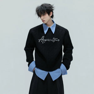 Front view of a layered preppy wool sweater with pearl details