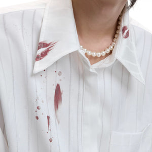 Black long sleeve button-down shirt with luxury satin-like cotton texture