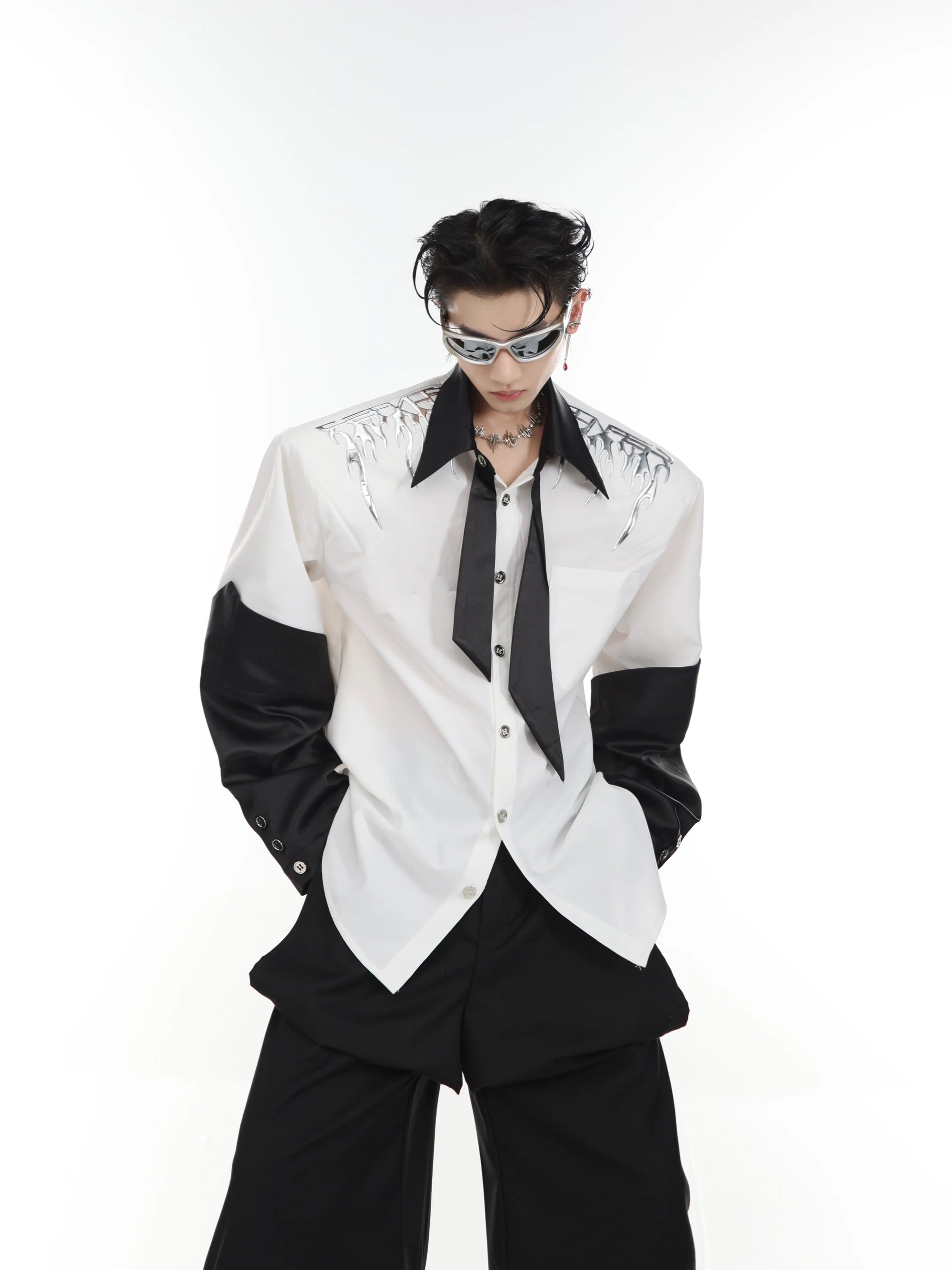 Front view of liquid metal oversized shirt jacket in black and white