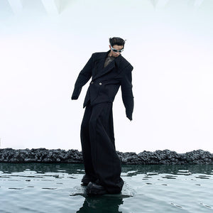 Back view showcasing the bold architectural silhouette of this statement blazer jacket