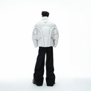 Side angle showing the bold architectural silhouette of this deconstructed streetwear jacket