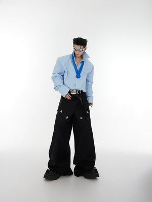 Fashion-forward streetwear shirt featuring bold architectural sleeves and layered design details