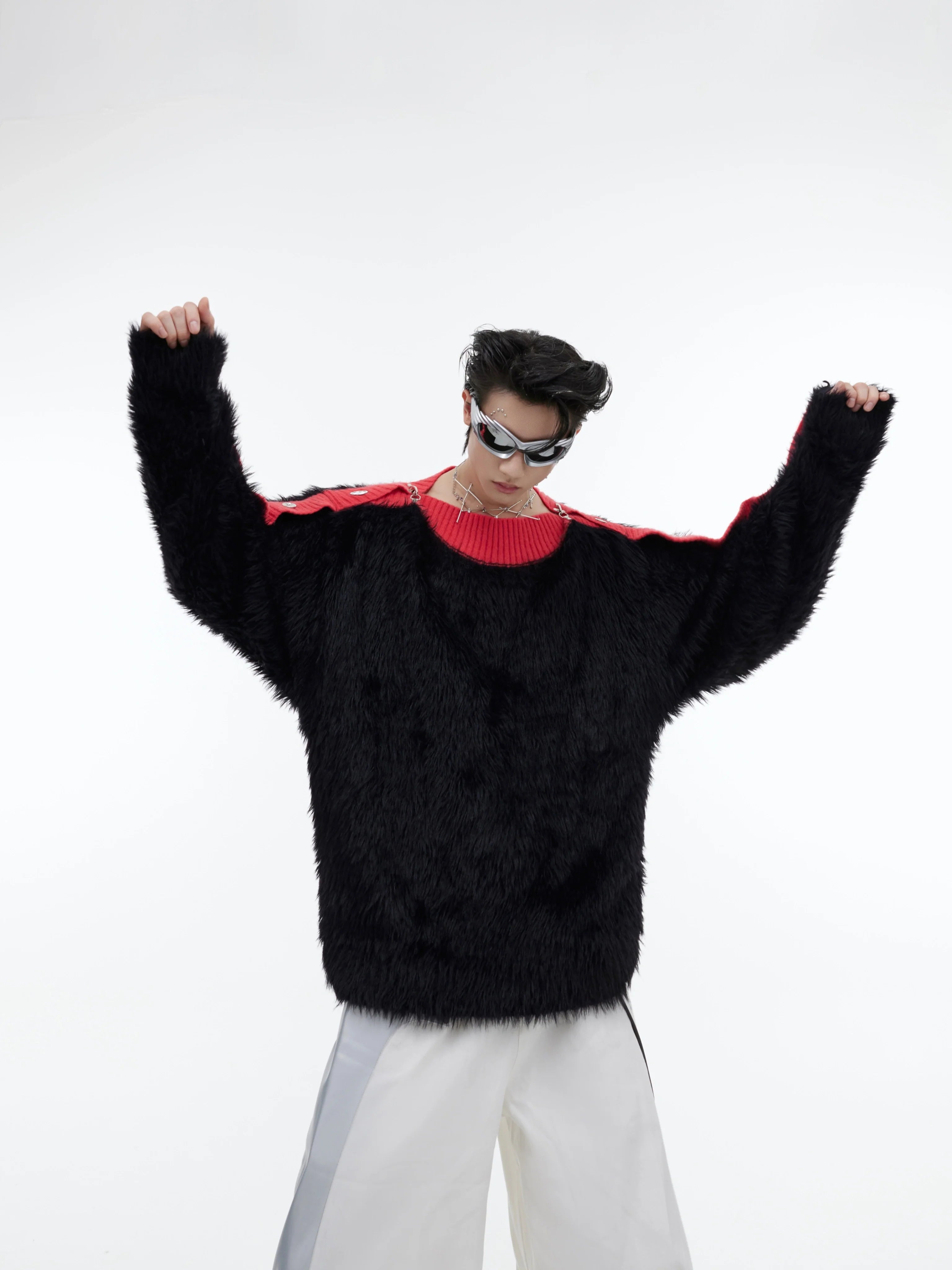 Off-shoulder chunky knit sweater featuring unique metal airplane clasp buttons and cable-knit texture, perfect for streetwear outfits