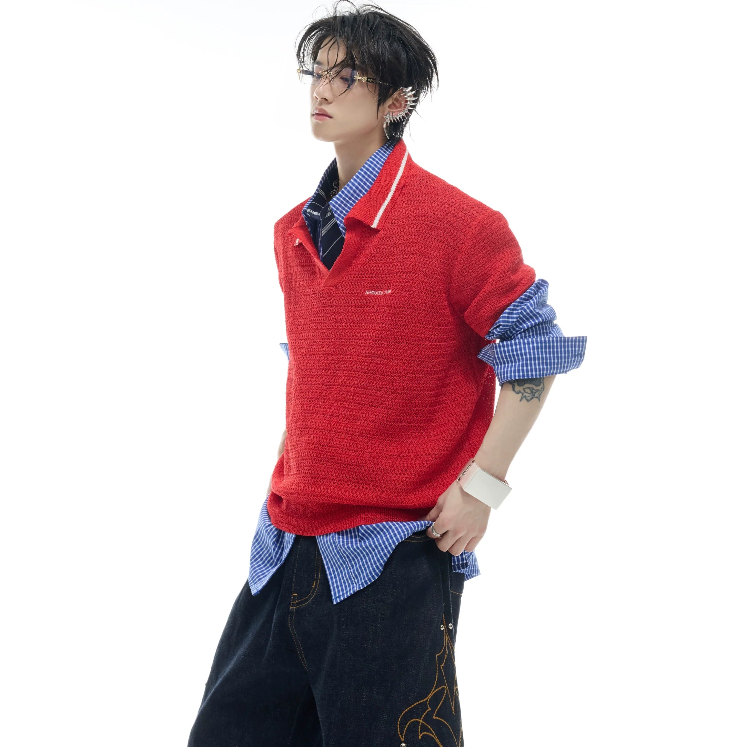 Color-block striped polo shirt with textured knit fabric, featuring a modern polo collar for urban streetwear style