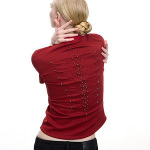 Side angle view of metal rivet slim fit shirt showing modern crew neckline design