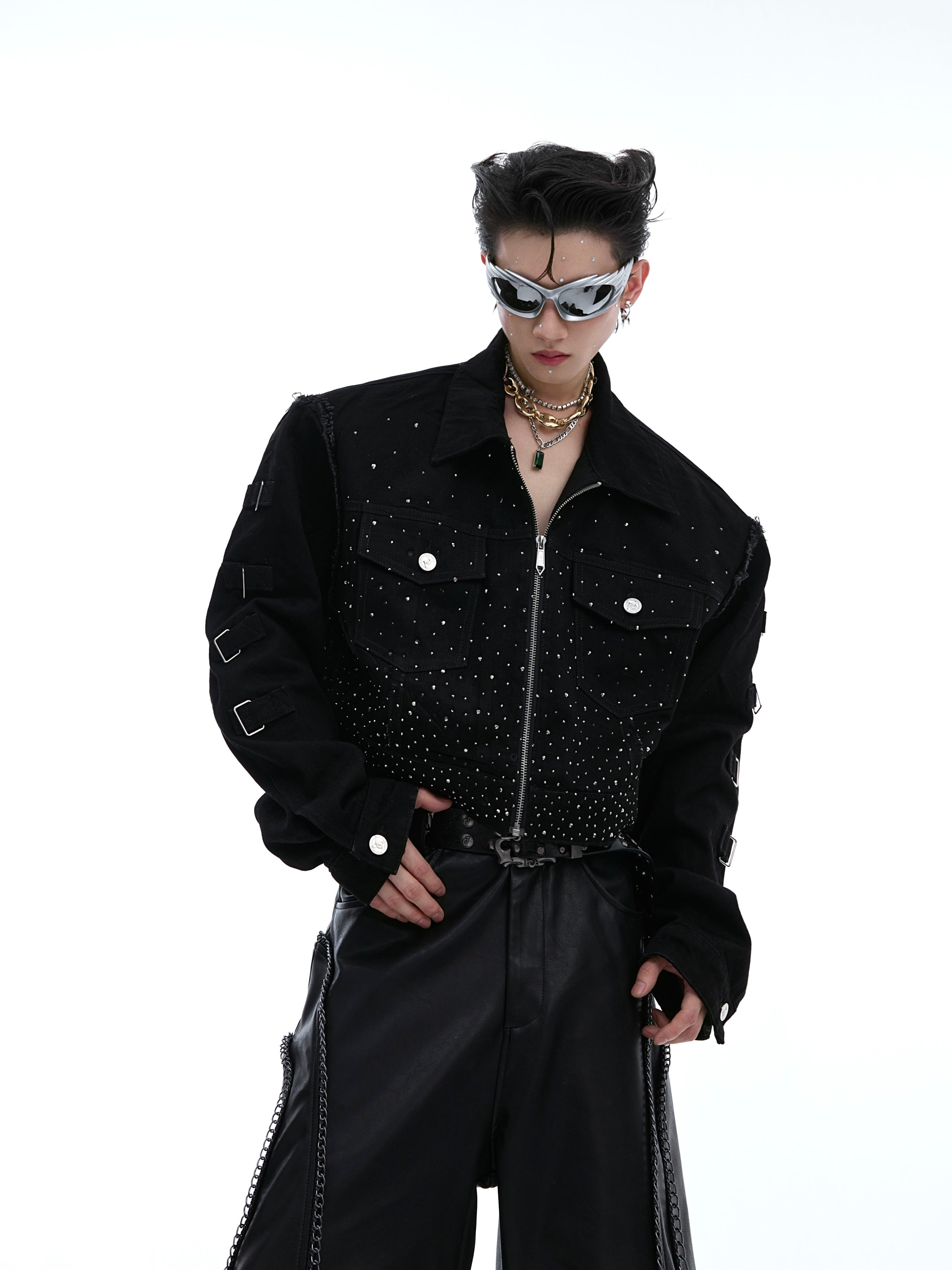 Front view of deconstructed cropped jacket featuring bold asymmetrical panels and 3D tailoring for urban edge