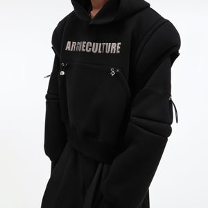 Model wearing the oversized deconstructed cropped hoodie showing its street-ready style and perfect fit